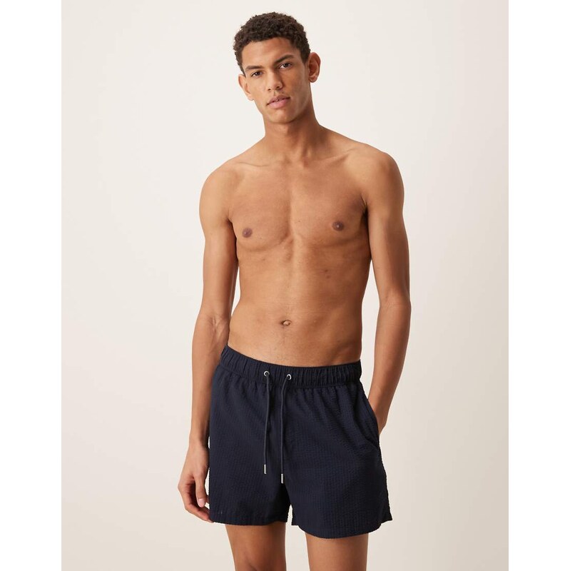 ASOS DESIGN seersucker swim shorts in short length in navy
