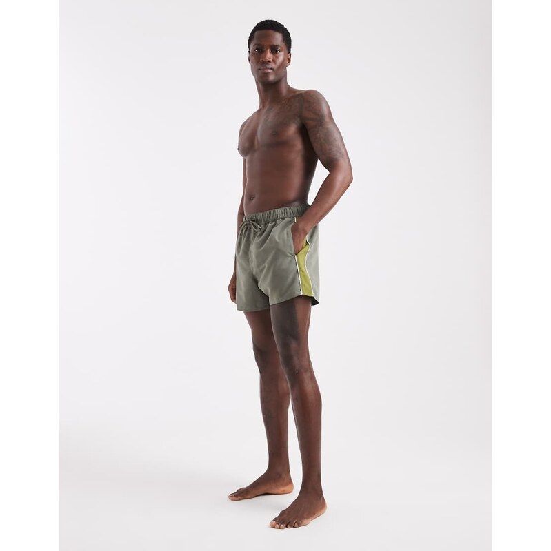 ASOS DESIGN swim shorts in short length in khaki with binding