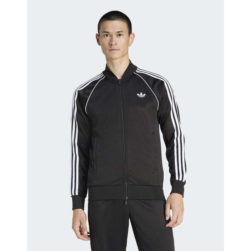 adidas Originals Sst track top in black