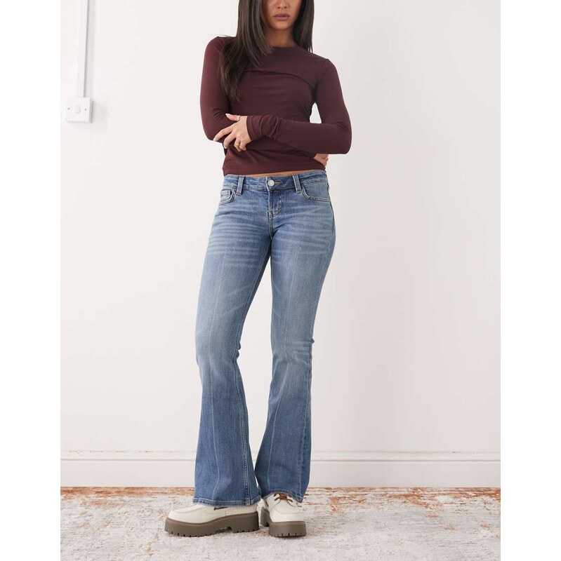 Monki back pocket detail flared jeans in light blue