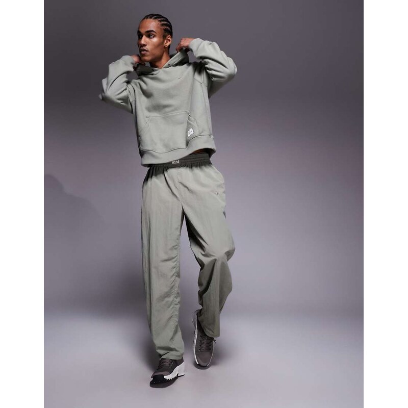 Nike Training Athletic Club badge logo hoodie in grey