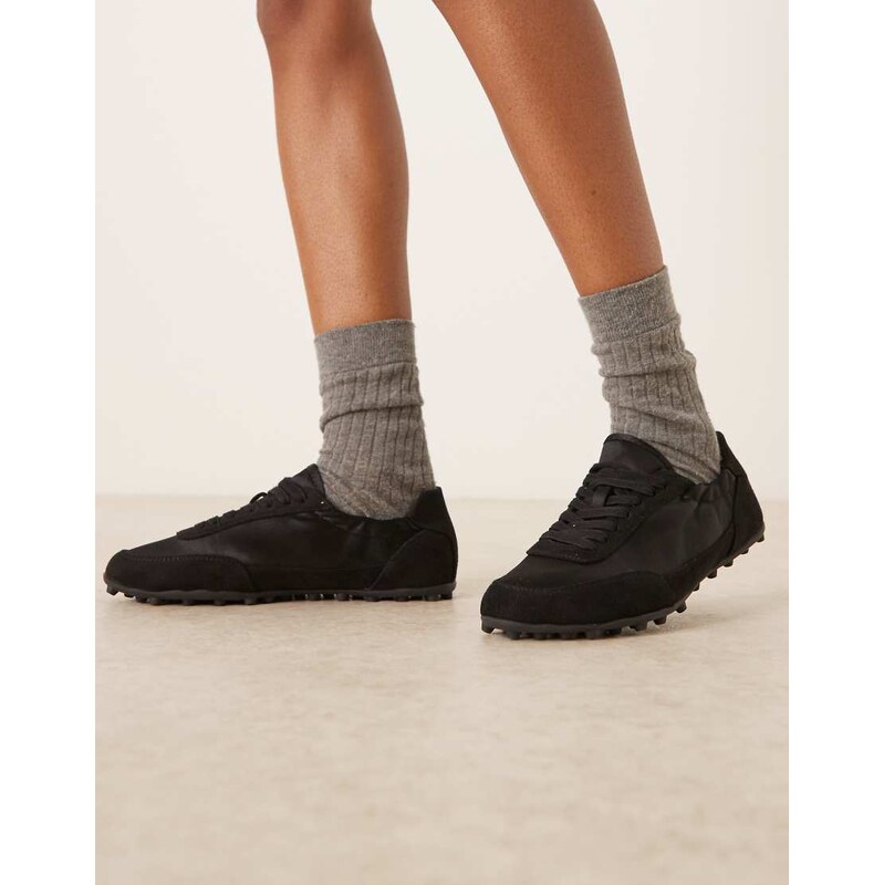 ASOS DESIGN Desire slim sole lace up trainers in black