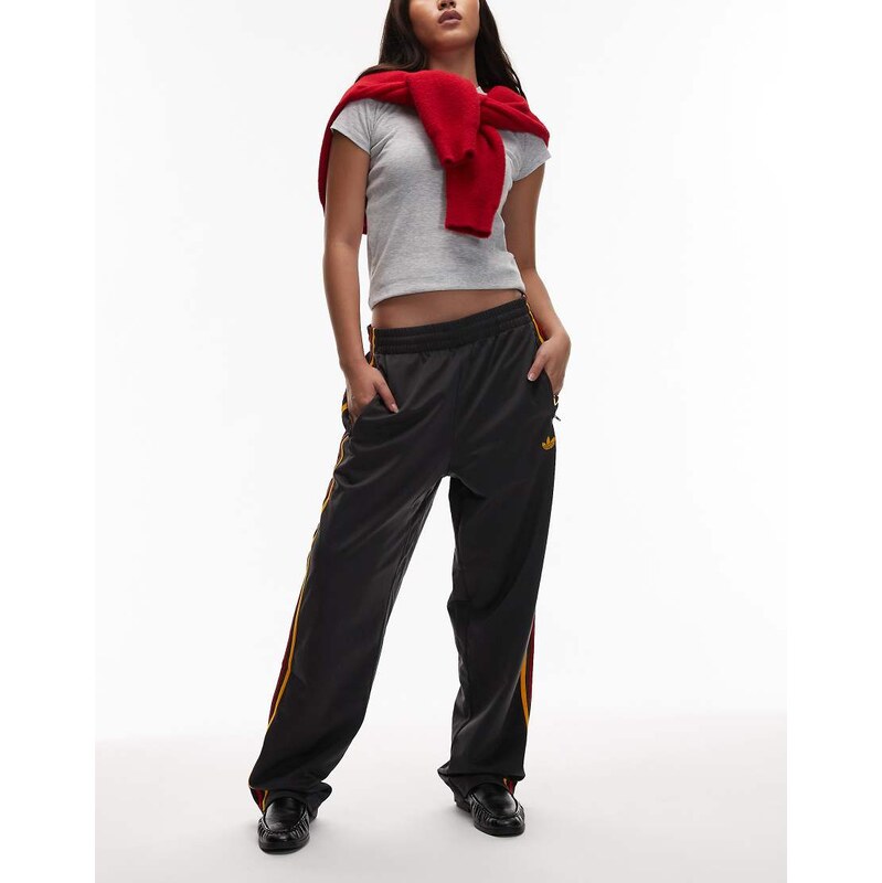 adidas Originals firebird track pants in black and gold