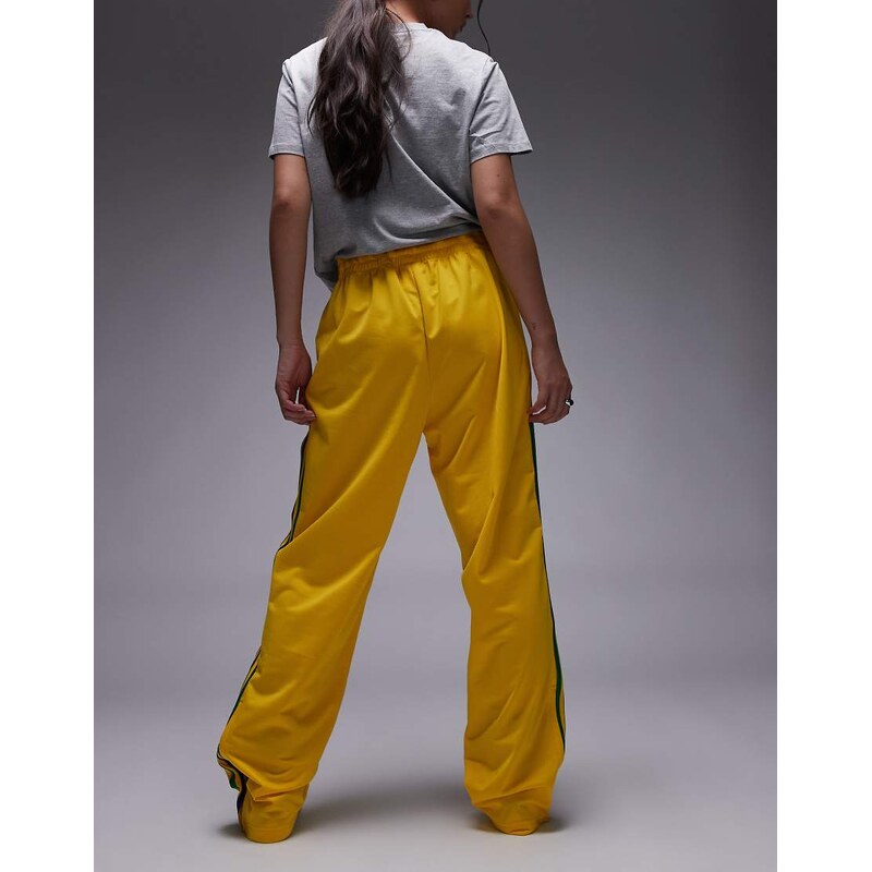 adidas Originals Firebird track pants in yellow and green