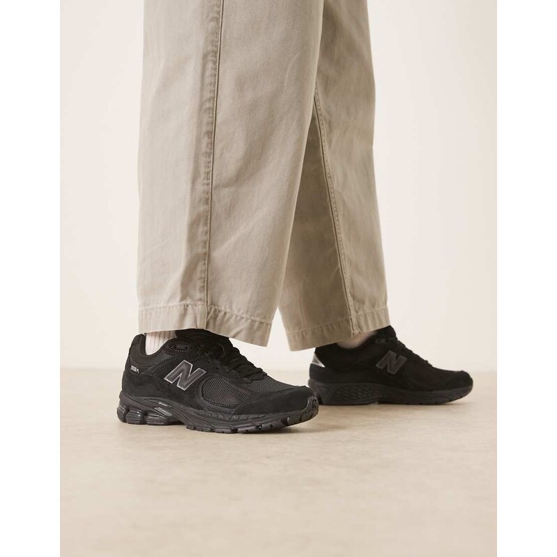 New Balance 2002 trainers in triple black