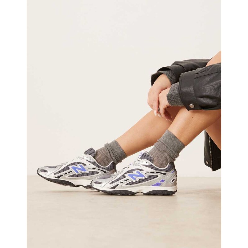 New Balance 204L trainers in silver metallic and indigo