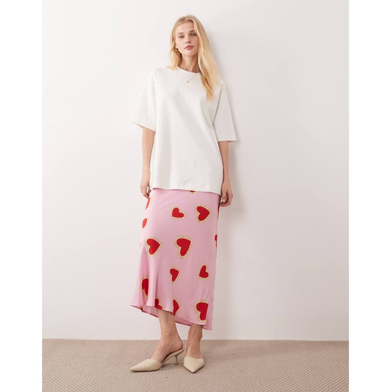 Never Fully Dressed dorris satin maxi skirt in pink heart print
