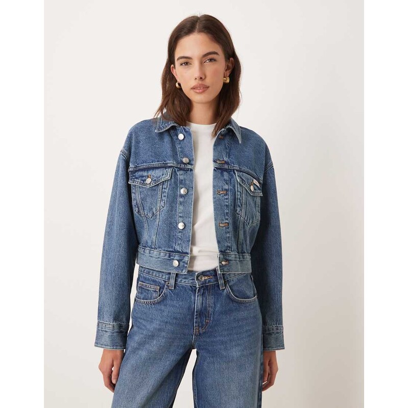 Calvin Klein Jeans cropped denim trucker jacket in mid wash blue