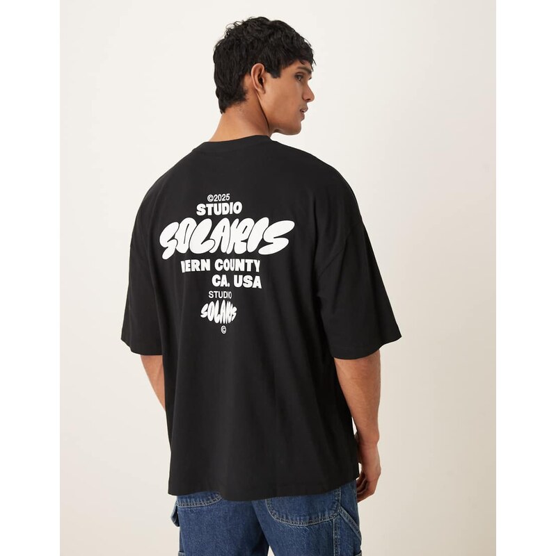 ASOS DESIGN oversized t-shirt with text print in black
