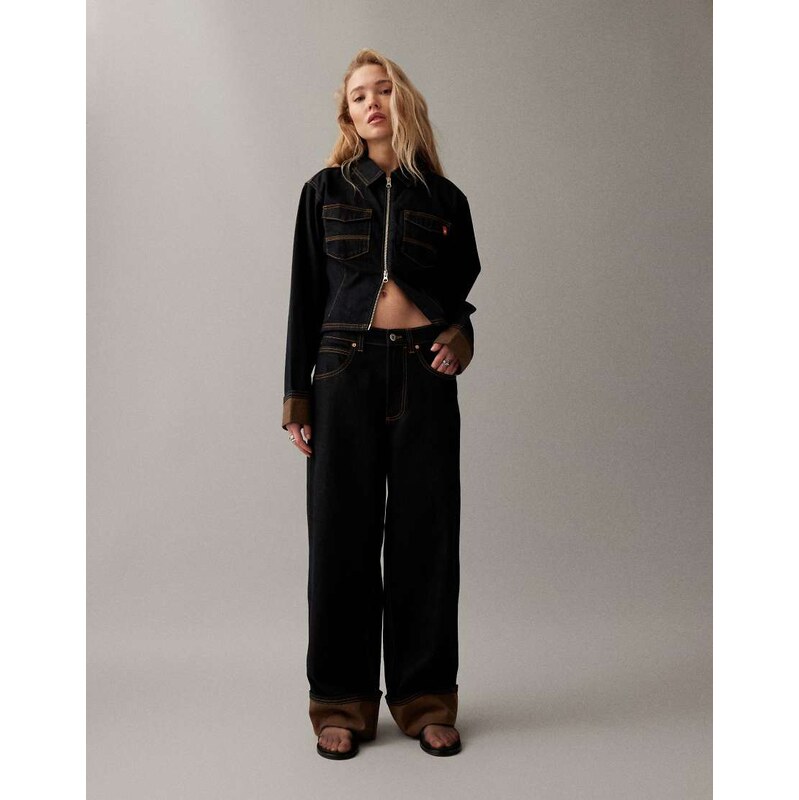 COLLUSION mid rise jean with orange contrast turn up hem in dark