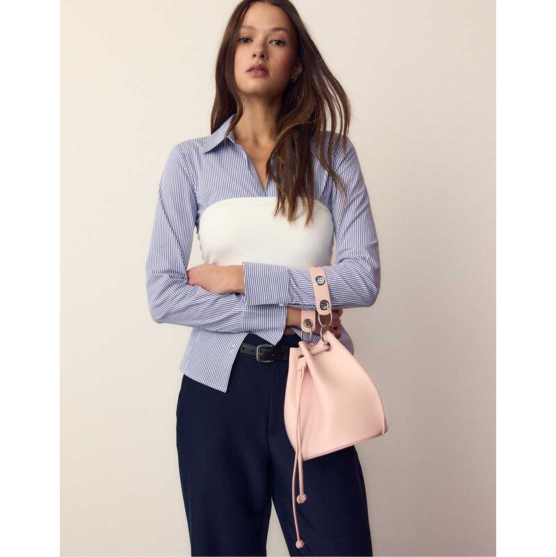 Stradivarius Rigid eyelet bucket bag in pastel pink 112979306