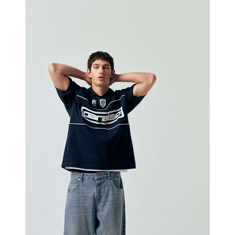 ASOS DESIGN oversized polo t-shirt with panels and paraiso