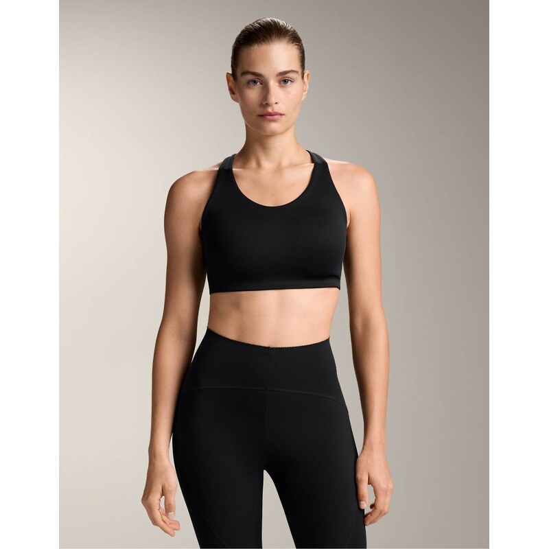 OYSHO high-support compressive crossover back sports bra in black 107713005