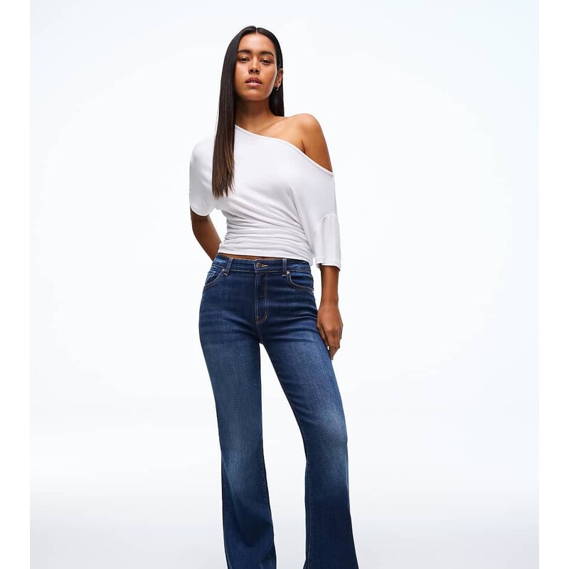 Bershka Petite flared jeans in denim blue
