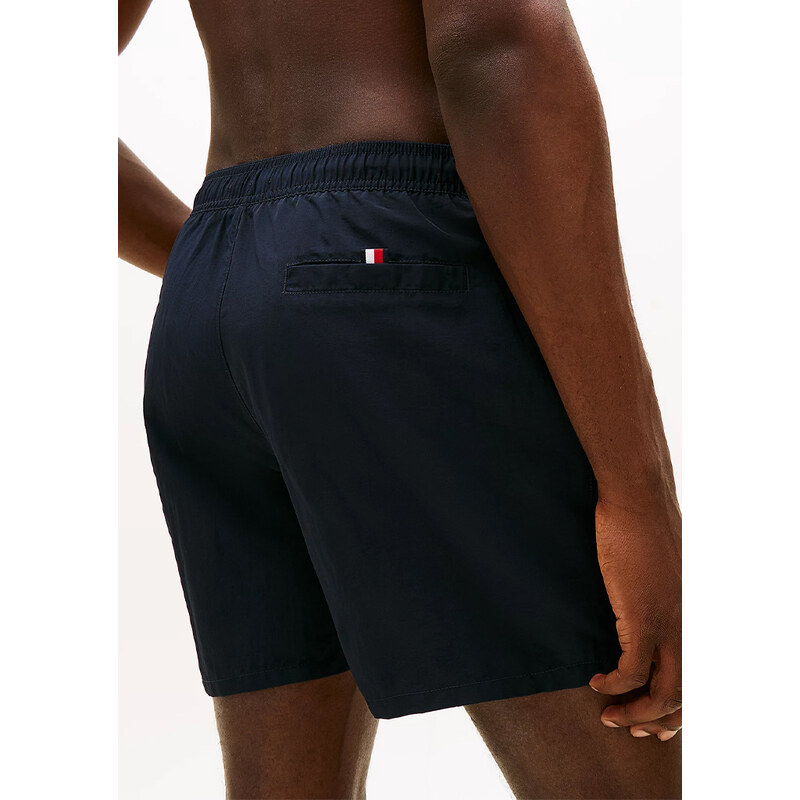 Pánské plavky Tommy Hilfiger UM0UM03748 Tm. modrá