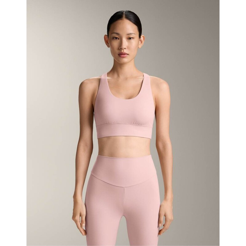 OYSHO Medium-support comfortlux sports bra with cups in pale pink 113062645