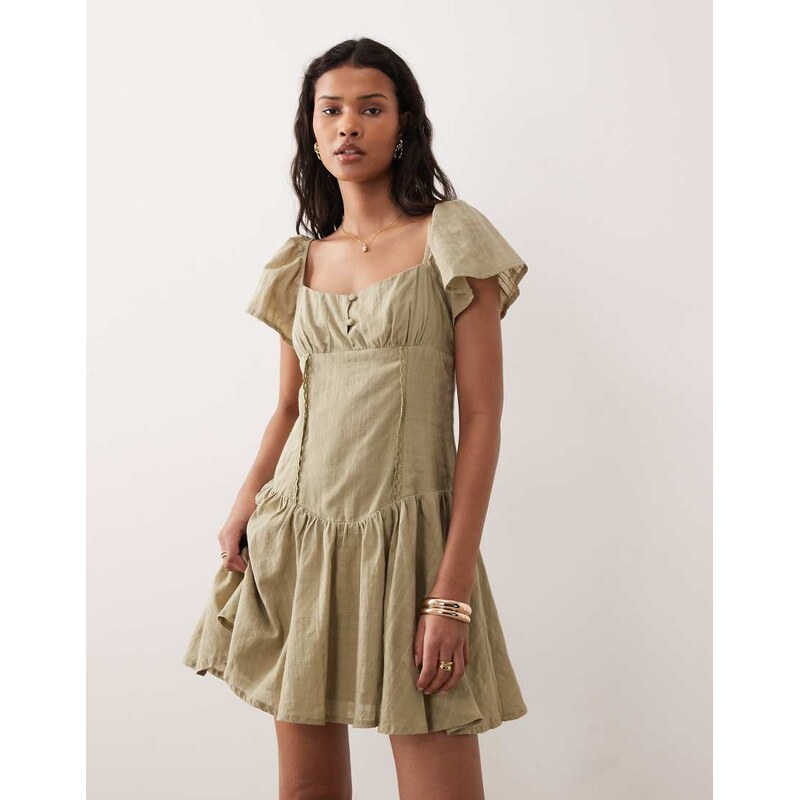 Kiss The Sky Eden textured drop waist mini dress in sage-Green