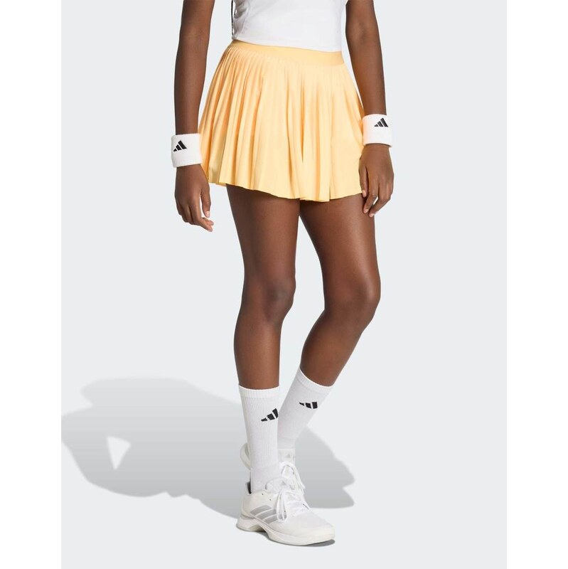 adidas performance Club pleated skirt in ice tangerine-Orange