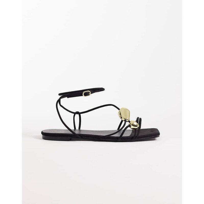 Glamorous flat sandals with gold detail in black 115519814