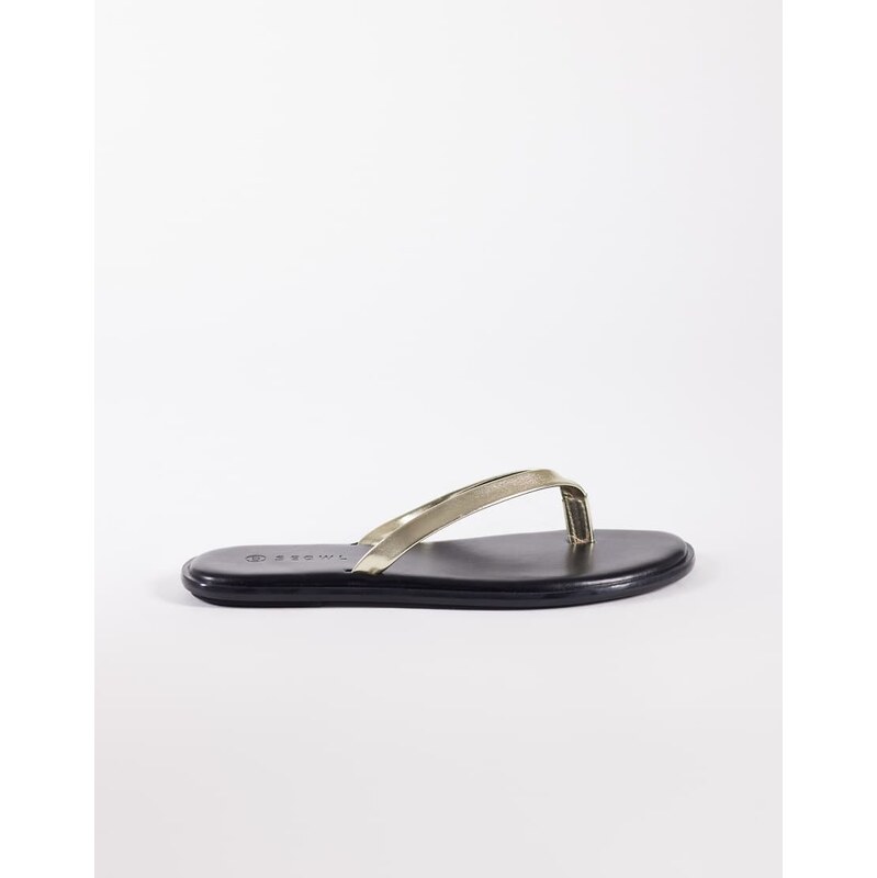 SEQWL jelly flip flops in black with gold strap