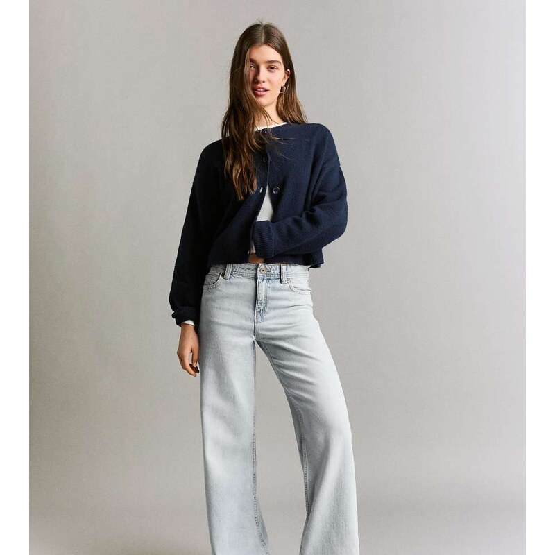 Bershka Petite baggy jeans in mid blue