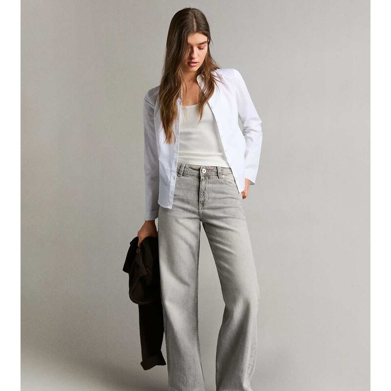 Bershka Petite baggy jeans in light grey
