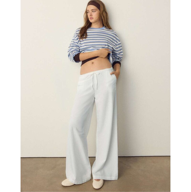Stradivarius Wide-leg trousers in ecru-White 113297393