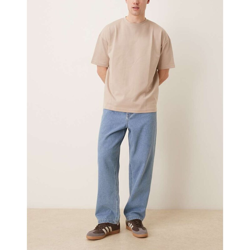 ASOS DESIGN relaxed tapered jeans in light wash blue