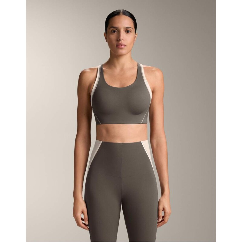 OYSHO Firm support compressive reflective sports bra in coal
