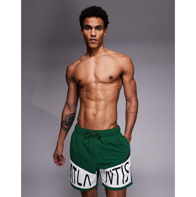 ASOS DESIGN swim shorts in mid length with placement print in