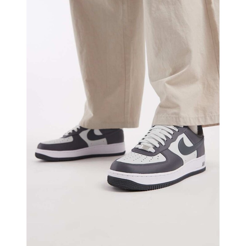 Nike Air Force 1 trainers in dark grey and off white