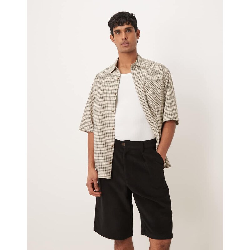 Prohibited double pleated shorts in black