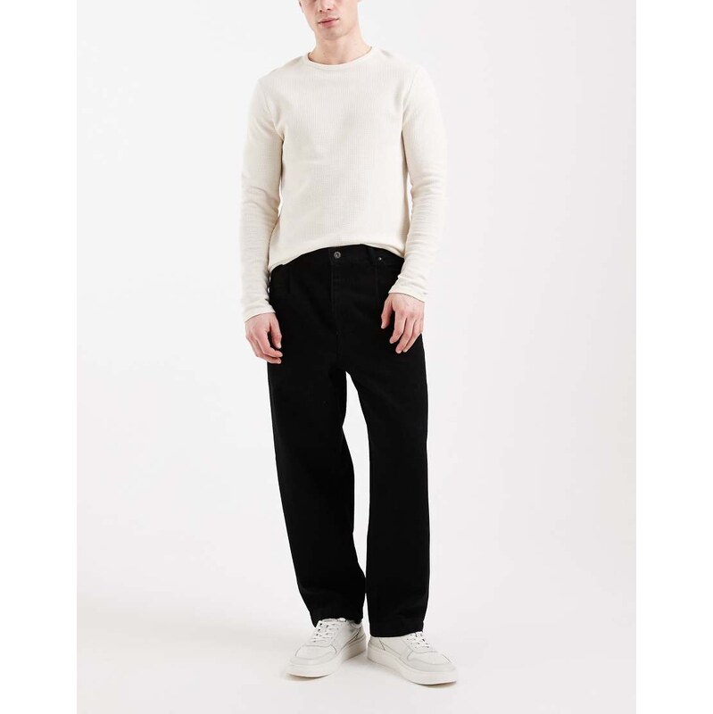 ASOS DESIGN relaxed tapered jeans in black
