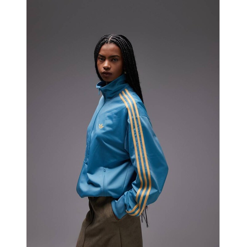 adidas Originals Firebird track top in blue and orange