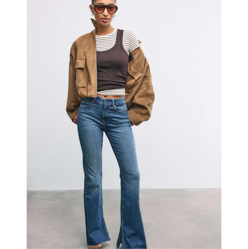 Stradivarius D74 bell bottom jeans with split in medium light