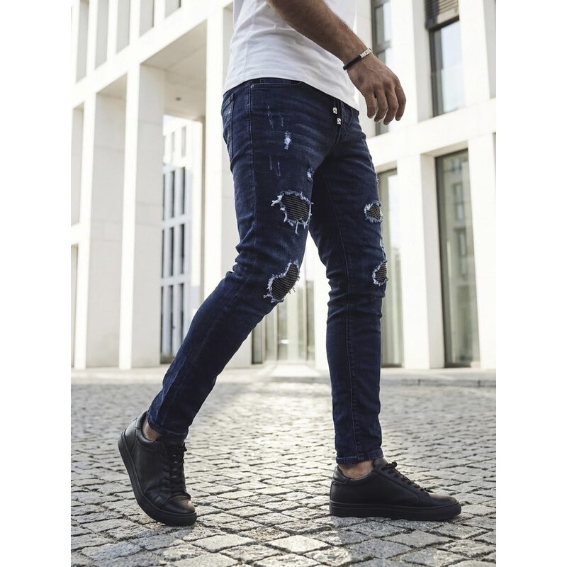 Dstreet Trendy tmavě modré rifle s módními odřeninami