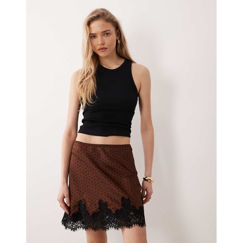 Mango mini skirt with lace trim in brown and black polka dot