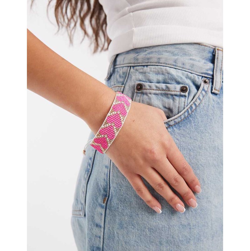 Accessorize woven heart beaded bracelet in pink 113638583