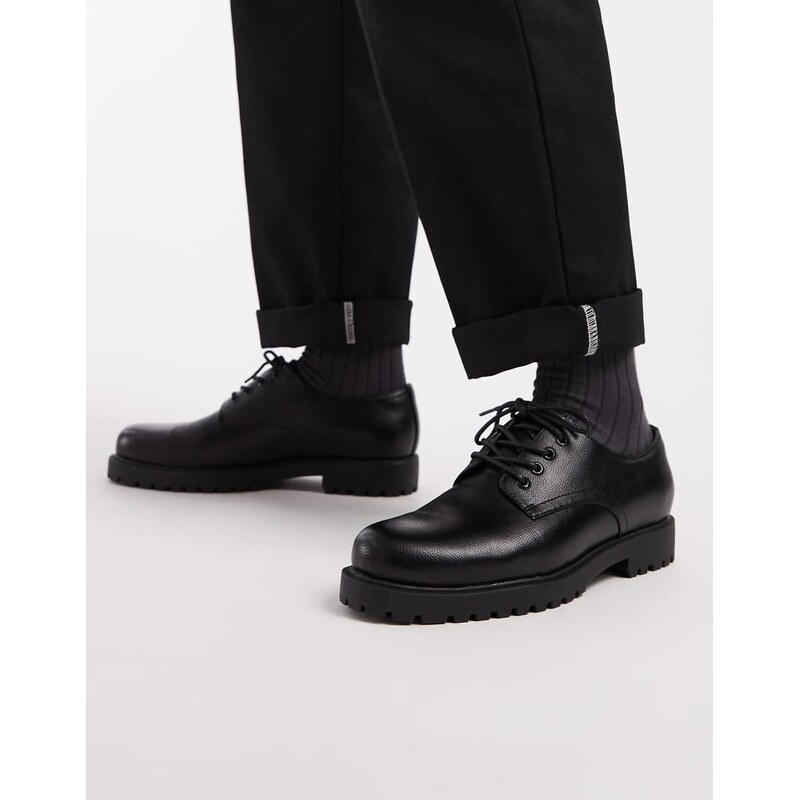 ASOS DESIGN lace up shoes in black with cleated sole