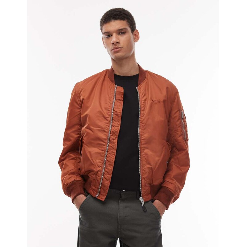 Schott tonal logo zip pocket detail cropped padded jacket in