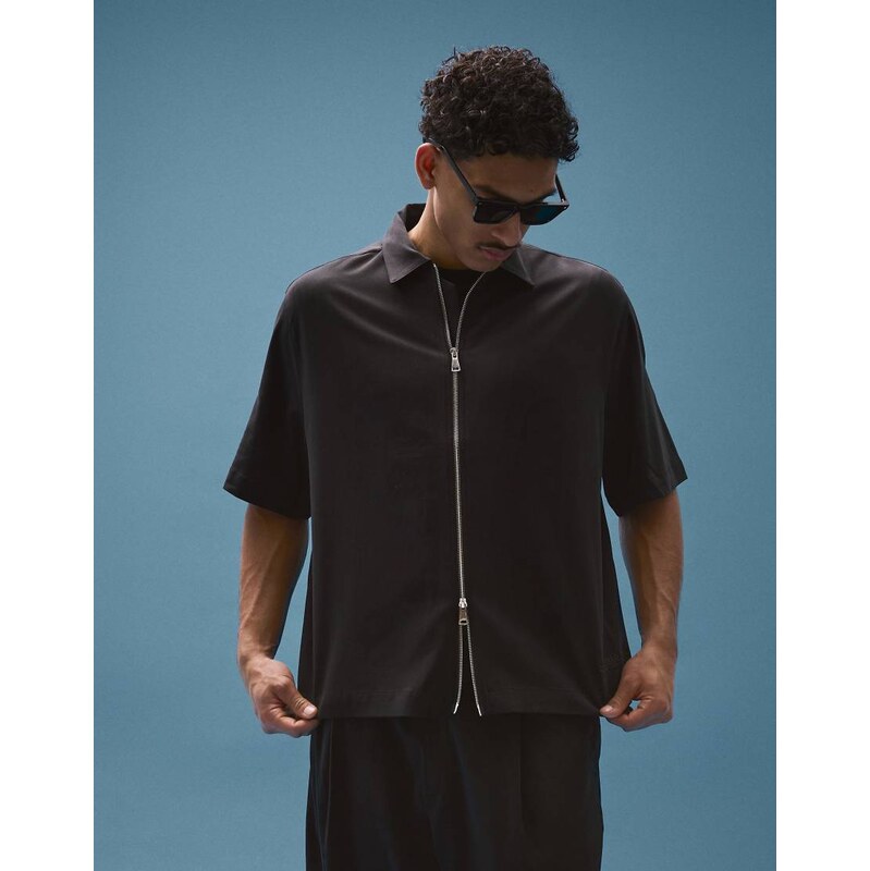 Bershka Fluid boxy short sleeve shirt in black