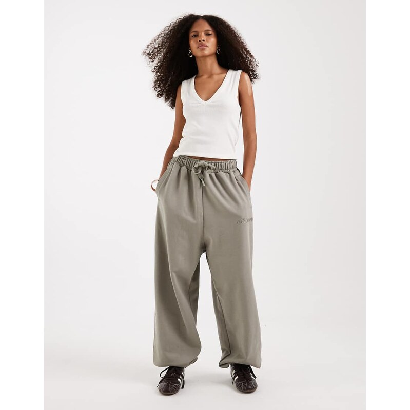 adidas Originals linear logo joggers in khaki-Green