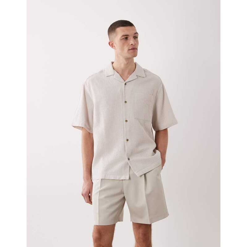 ASOS DESIGN tailored pleated wide shorts in ecru-Neutral