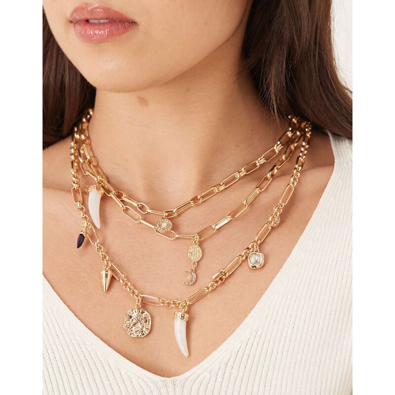 Accessorize layered charm necklace in gold 113638529