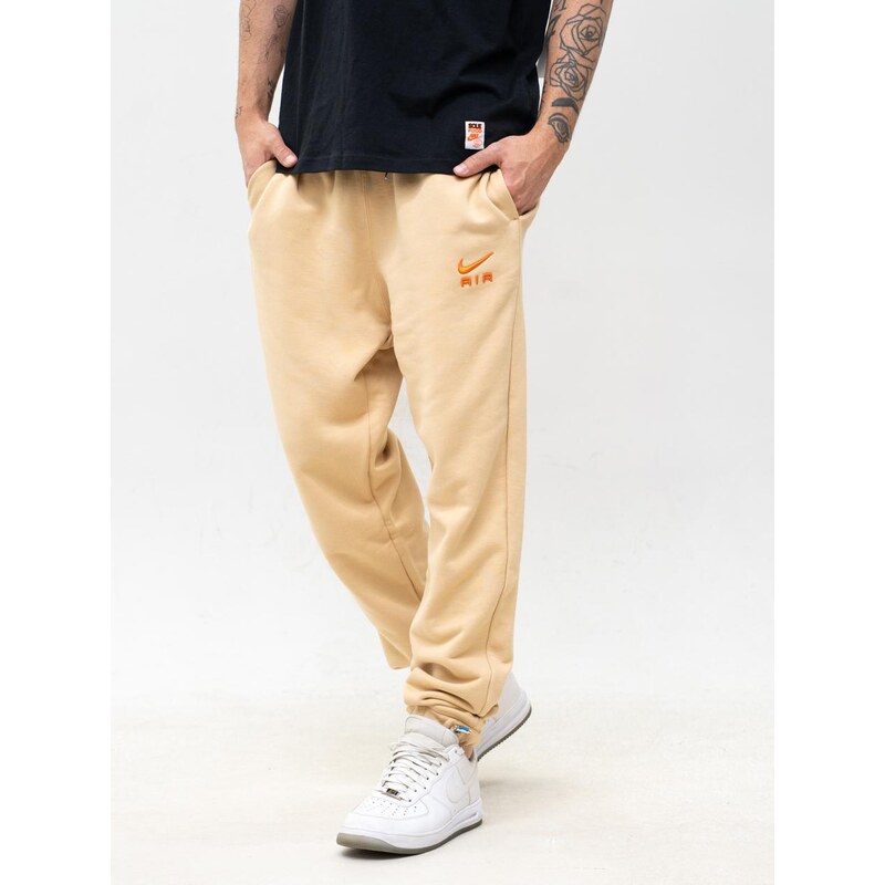 Pánské teplákové kalhoty béžové / oranžové Nike Air