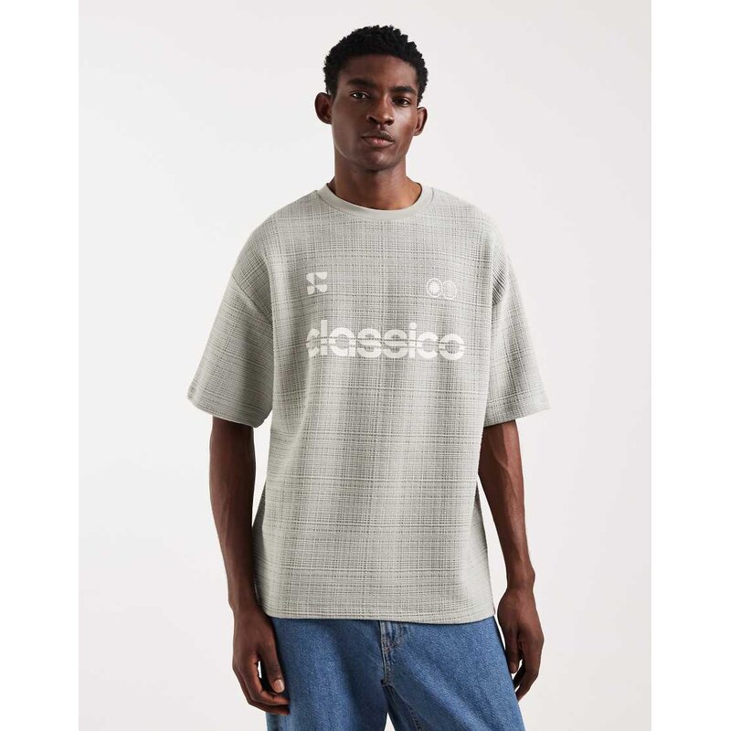 ASOS DESIGN heavyweight oversized t-shirt with football graphic