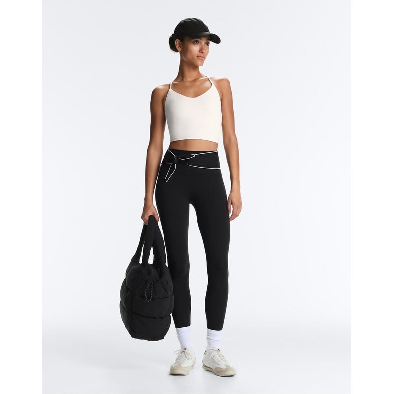 OYSHO Comfortlux high-rise ankle-length leggings with bow in black 113880655