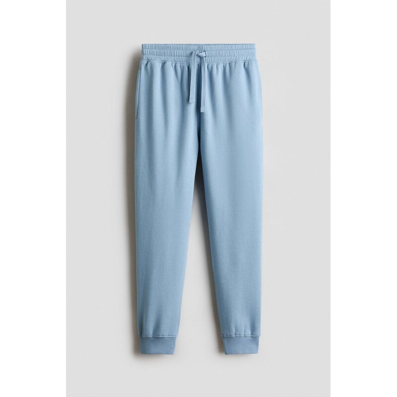 H&M - Kalhoty typu jogger z bavlněné teplákoviny - Modrá