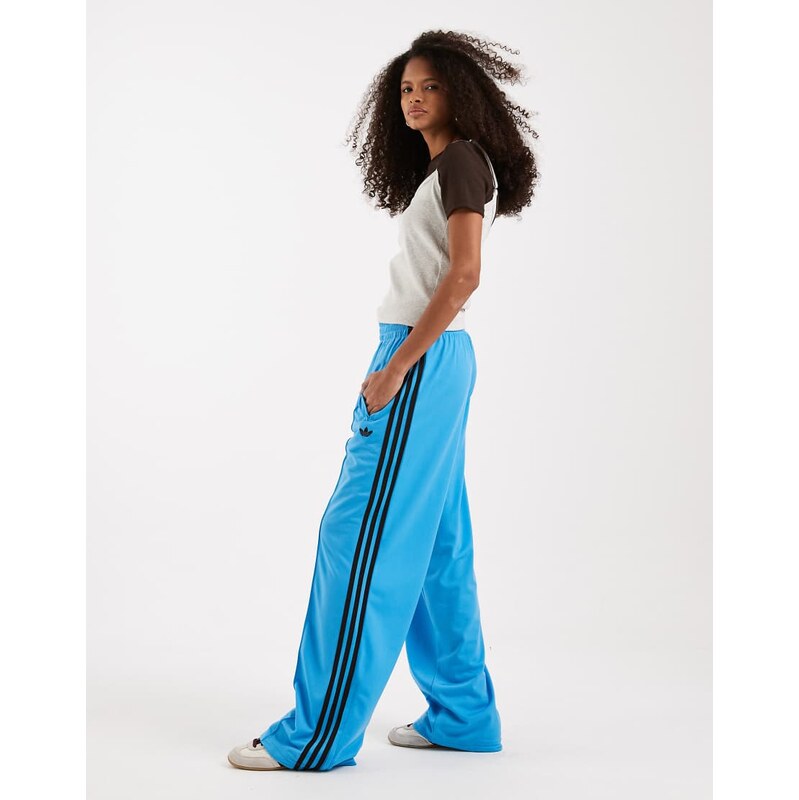 adidas Originals Firebird loose track pants in blue and brown