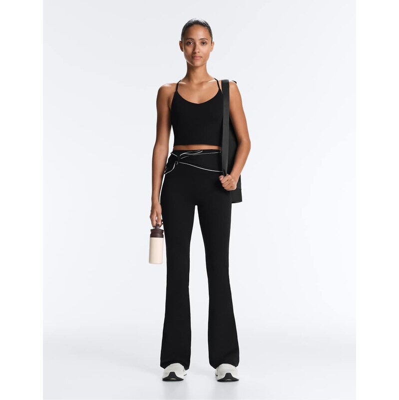 OYSHO Comfortlux high-rise flare trousers with bow in black 113880656